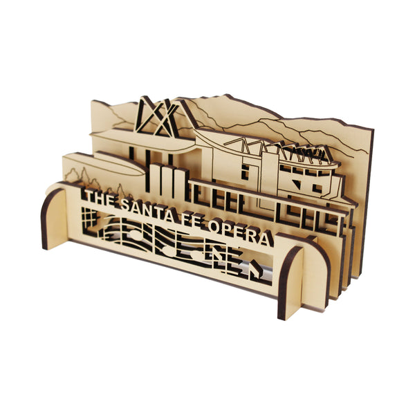 Image of a wooden 3D puzzle of the Santa Fe Opera theater.