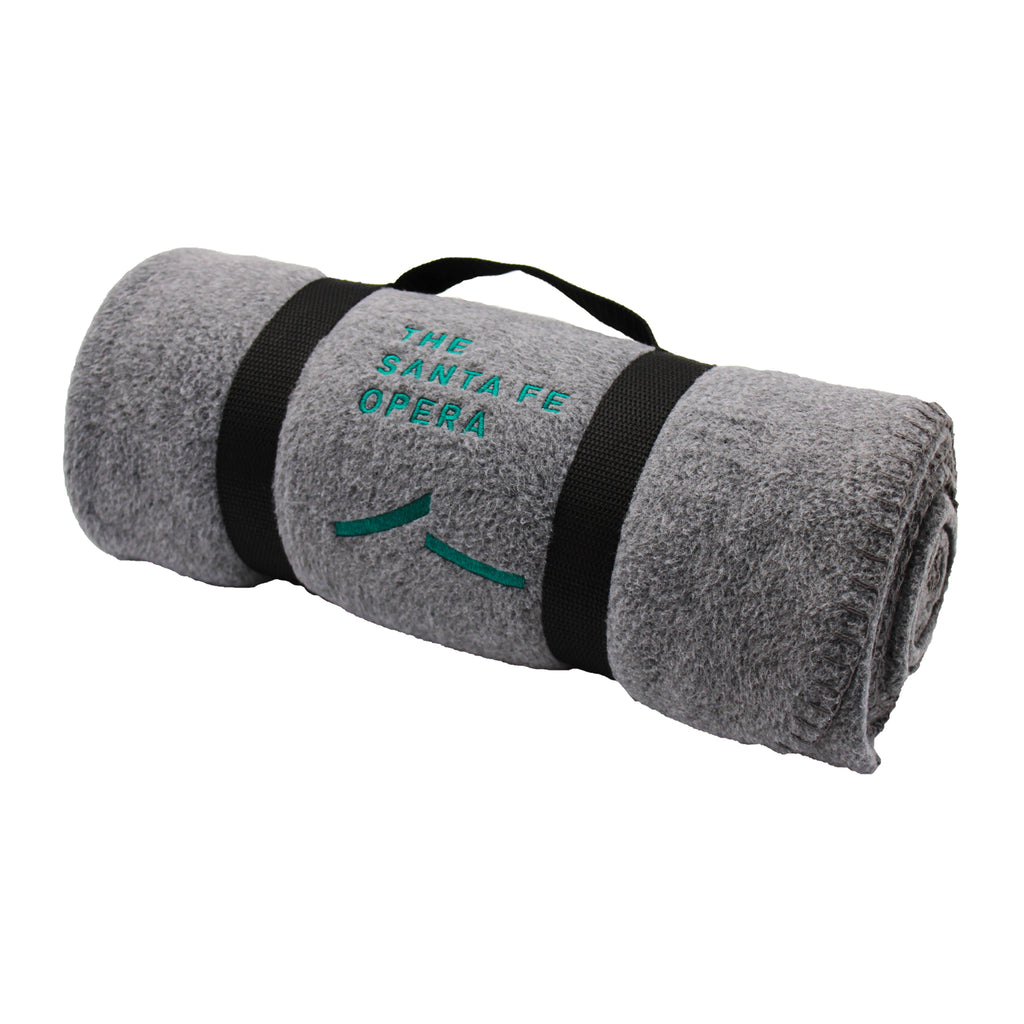 Gray blanket with black straps and the Santa Fe Opera logo in green.