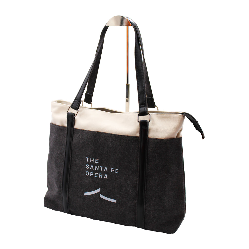 Black and cream tote bag with the Santa Fe Opera logo in light grey.