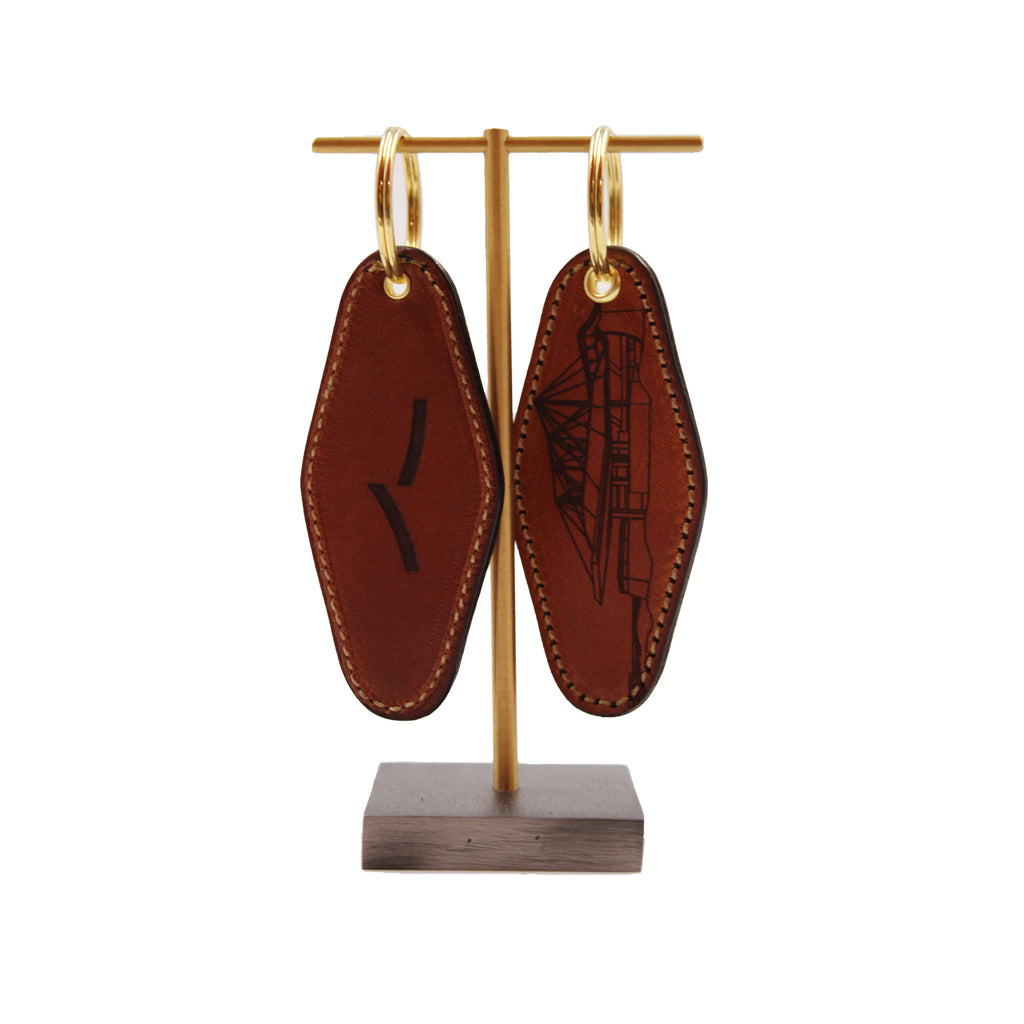Brown leather keychain with theater drawing and Santa Fe Opera logo.