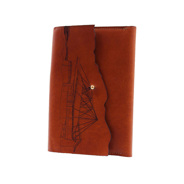 Brown leather journal with theater drawing. Includes pencil.