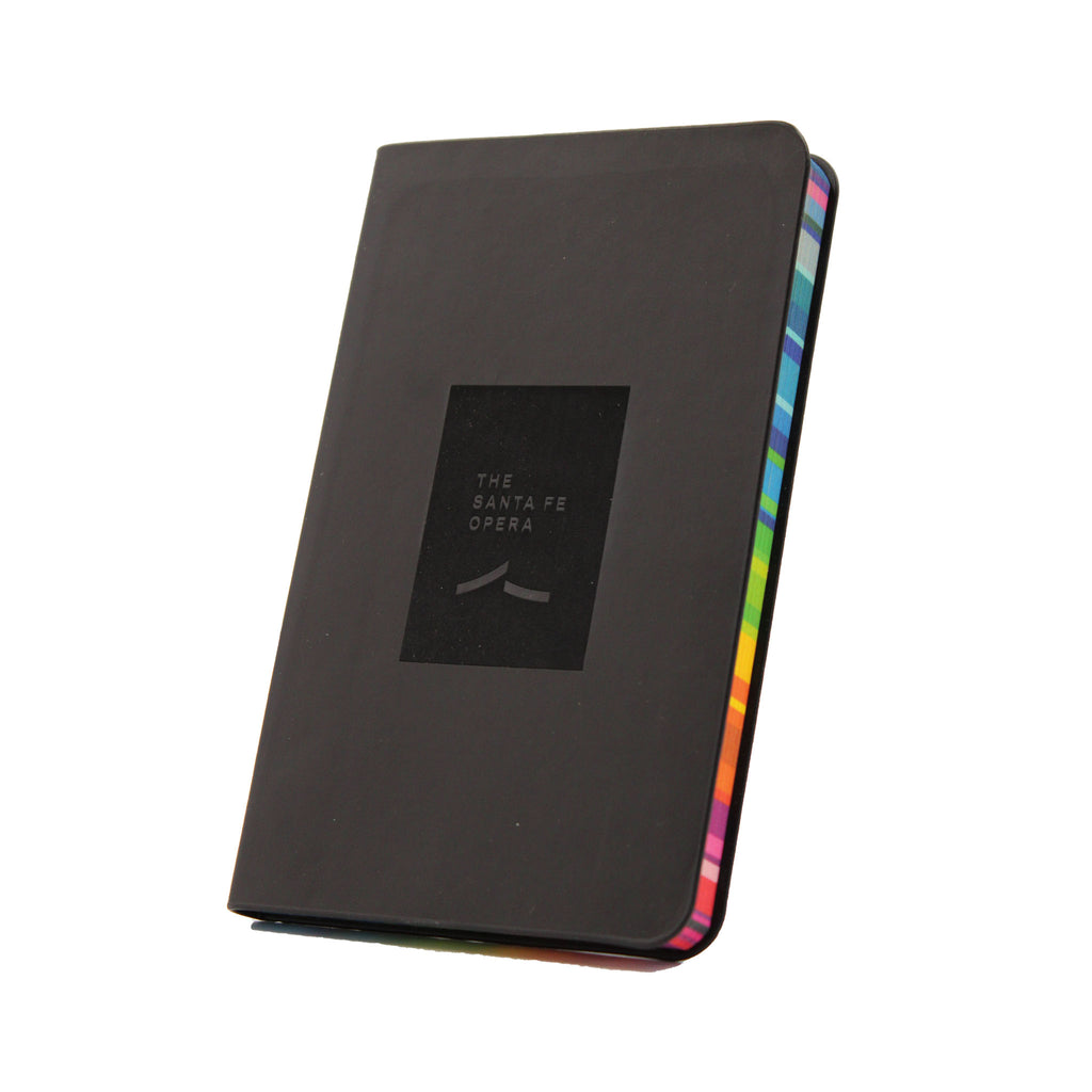 image of black note book with embossed logo