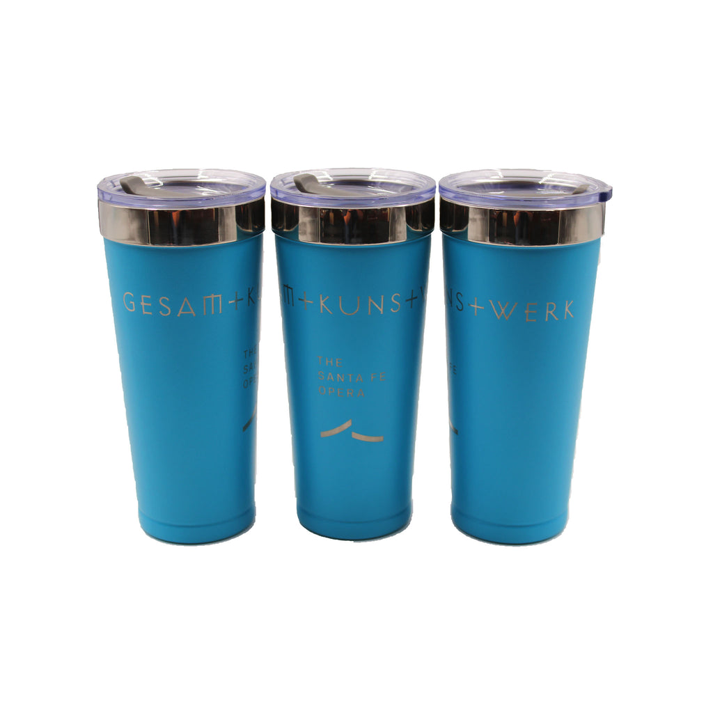 Teal blue stainless steal tumbler with powder coat finish and embossed logo. Embossed "Gesamt Kunst Werk". Clear swivel lid.